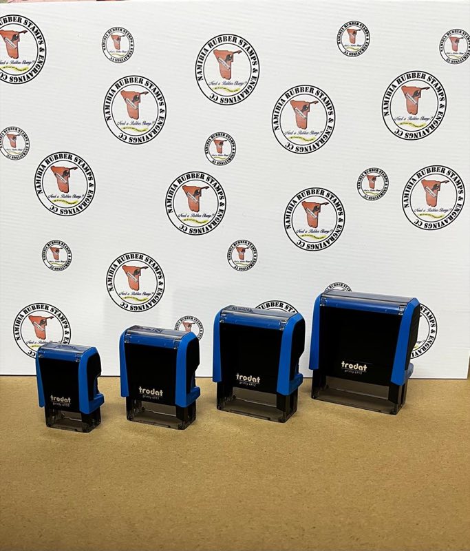 Four Trodat Printy self-inking stamps in ascending sizes