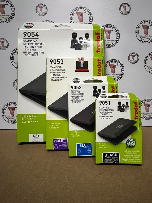 Four boxed Trodat stamp pads in sizes 9051 to 9054